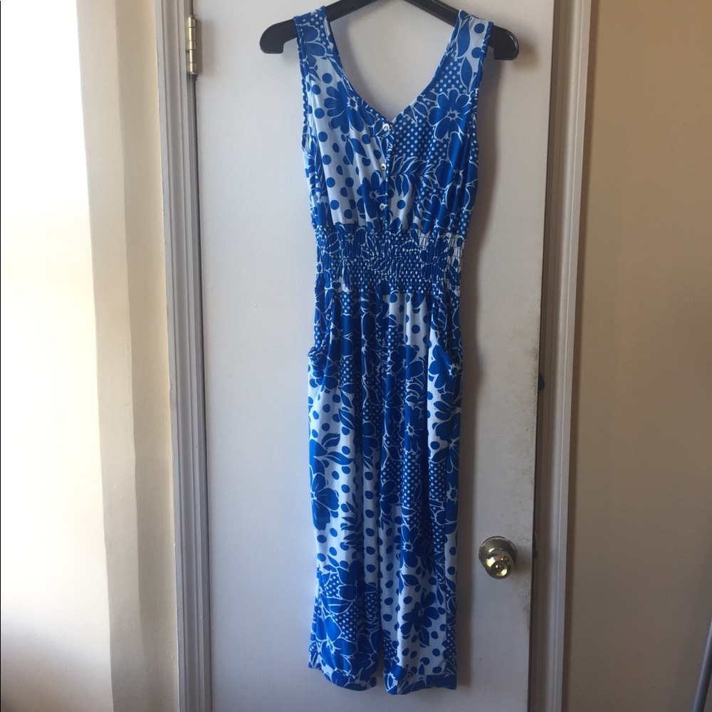 Never worn floral blue jumpsuit! Great for summer!